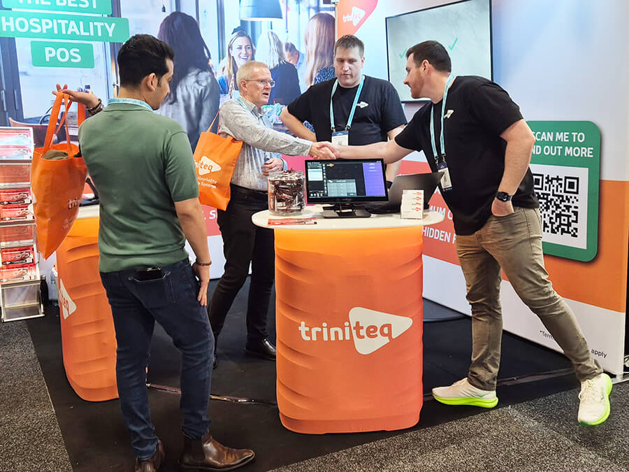 The Triniteq team at a hospitality expo stand