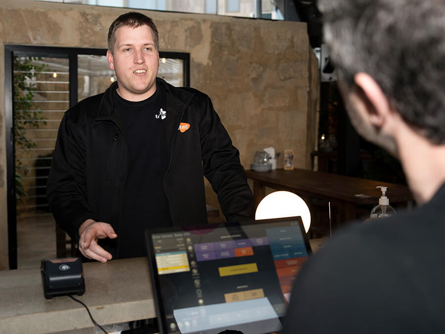 Triniteq setting up PowerEPOS on site in a venue