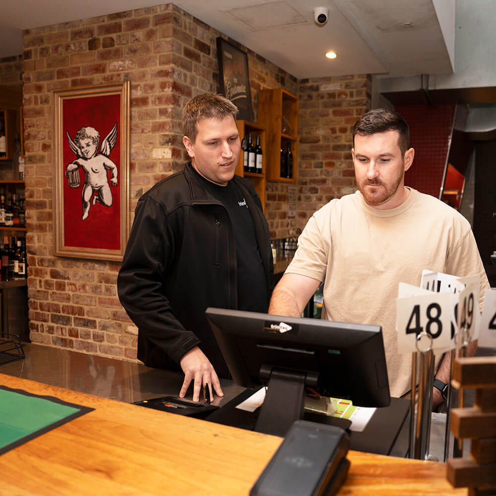 Triniteq team member supporting staff on site at CY O'Connor Pub