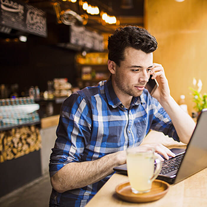 A Franchisee working in his business on his laptop